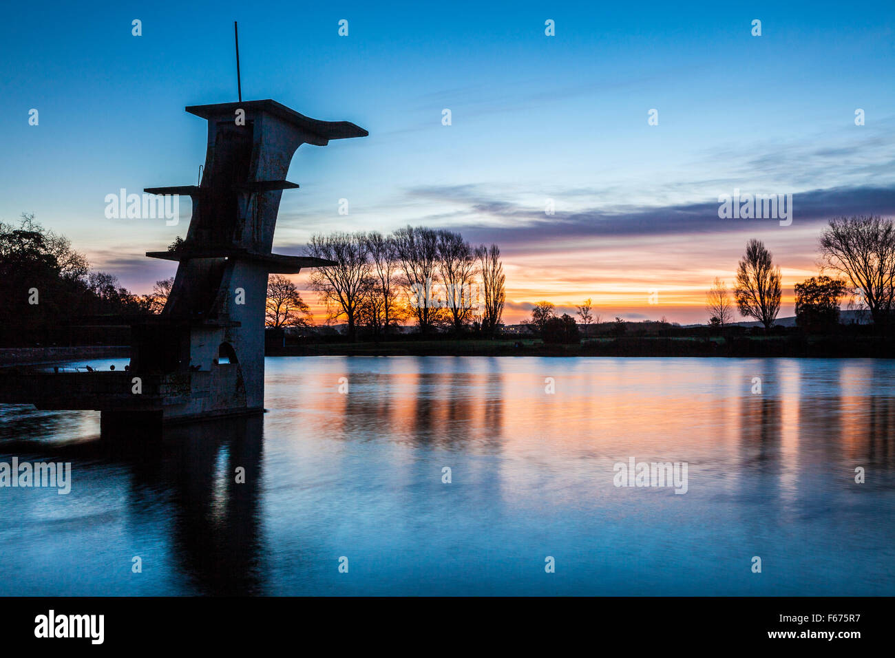 The old diving board at Coate Water in Swindon at dawn Stock Photo Alamy