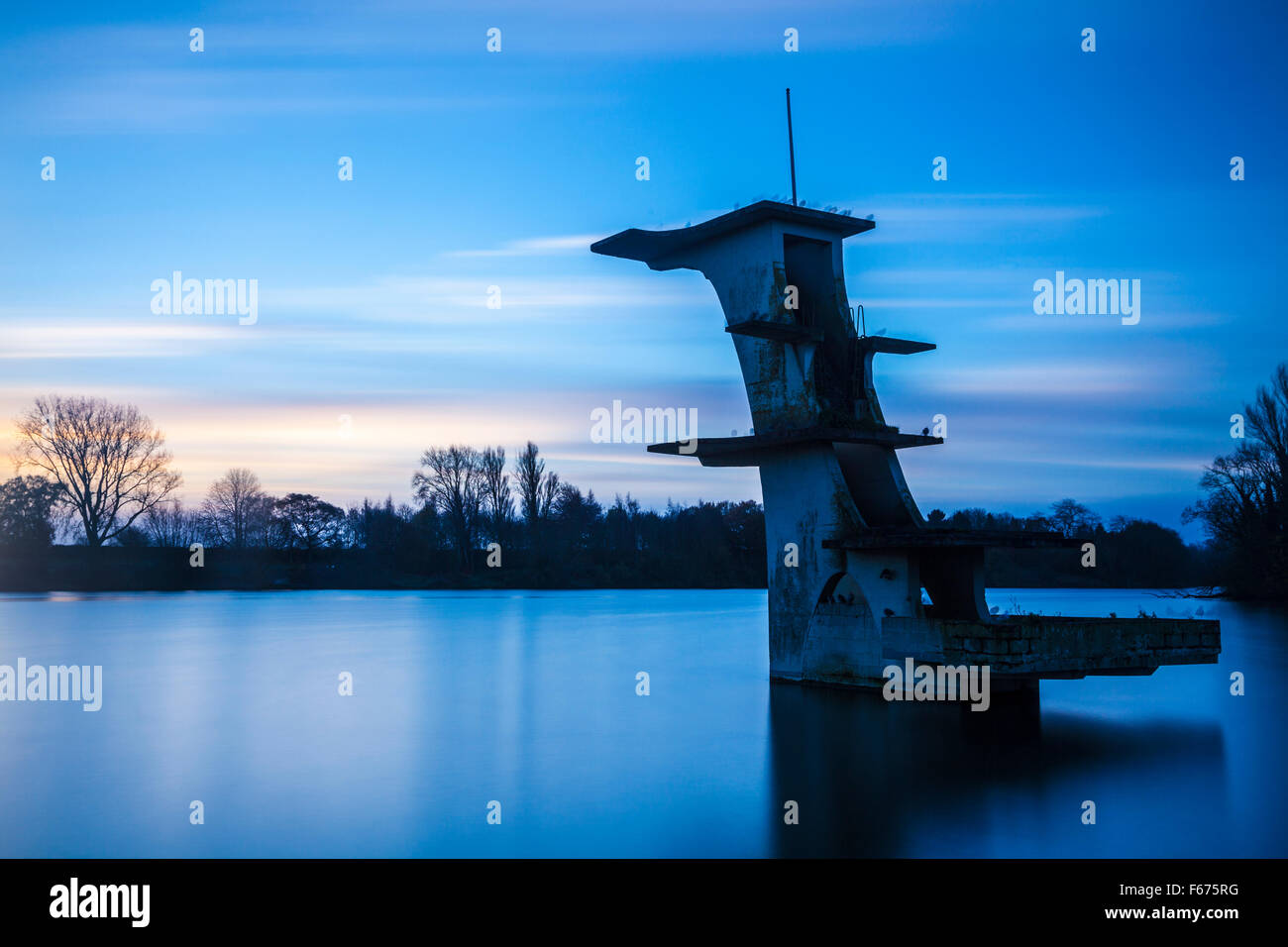 The old diving board at Coate Water in Swindon at dawn Stock Photo Alamy