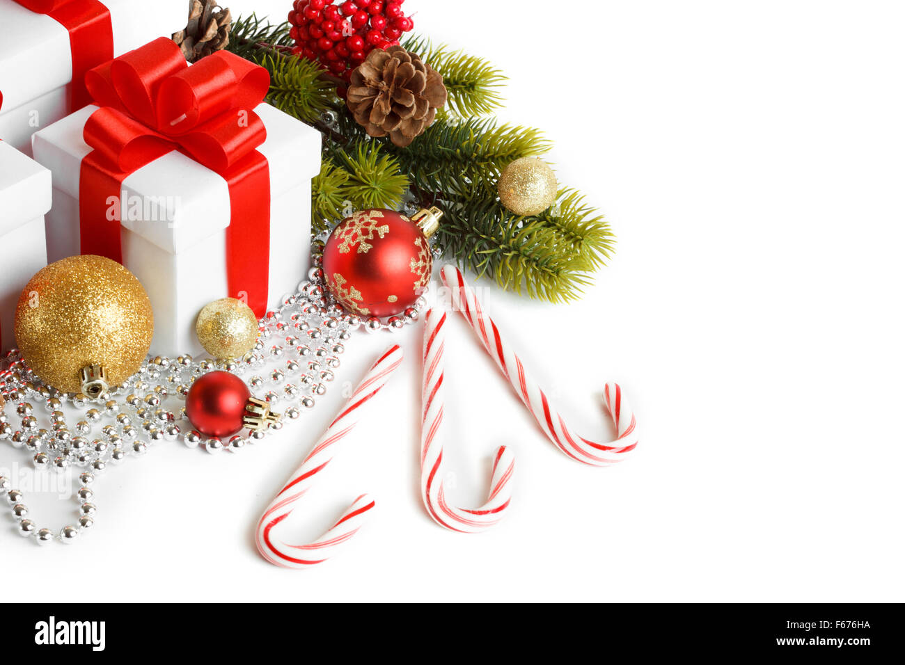 Gift with christmas tree and candy Stock Photo - Alamy