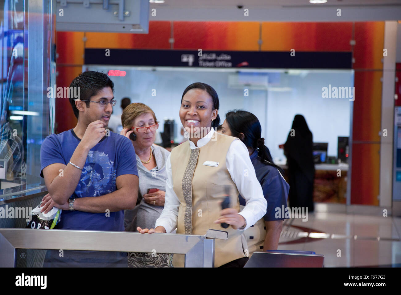 Staff assistance in the Dubai Metro Stock Photo