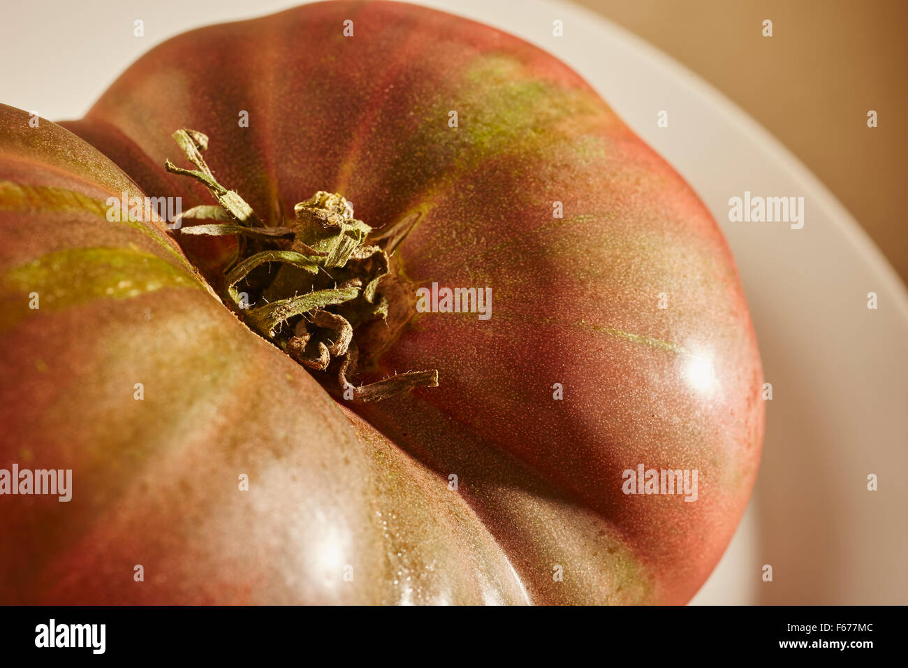 ripe heirloom tomato Stock Photo
