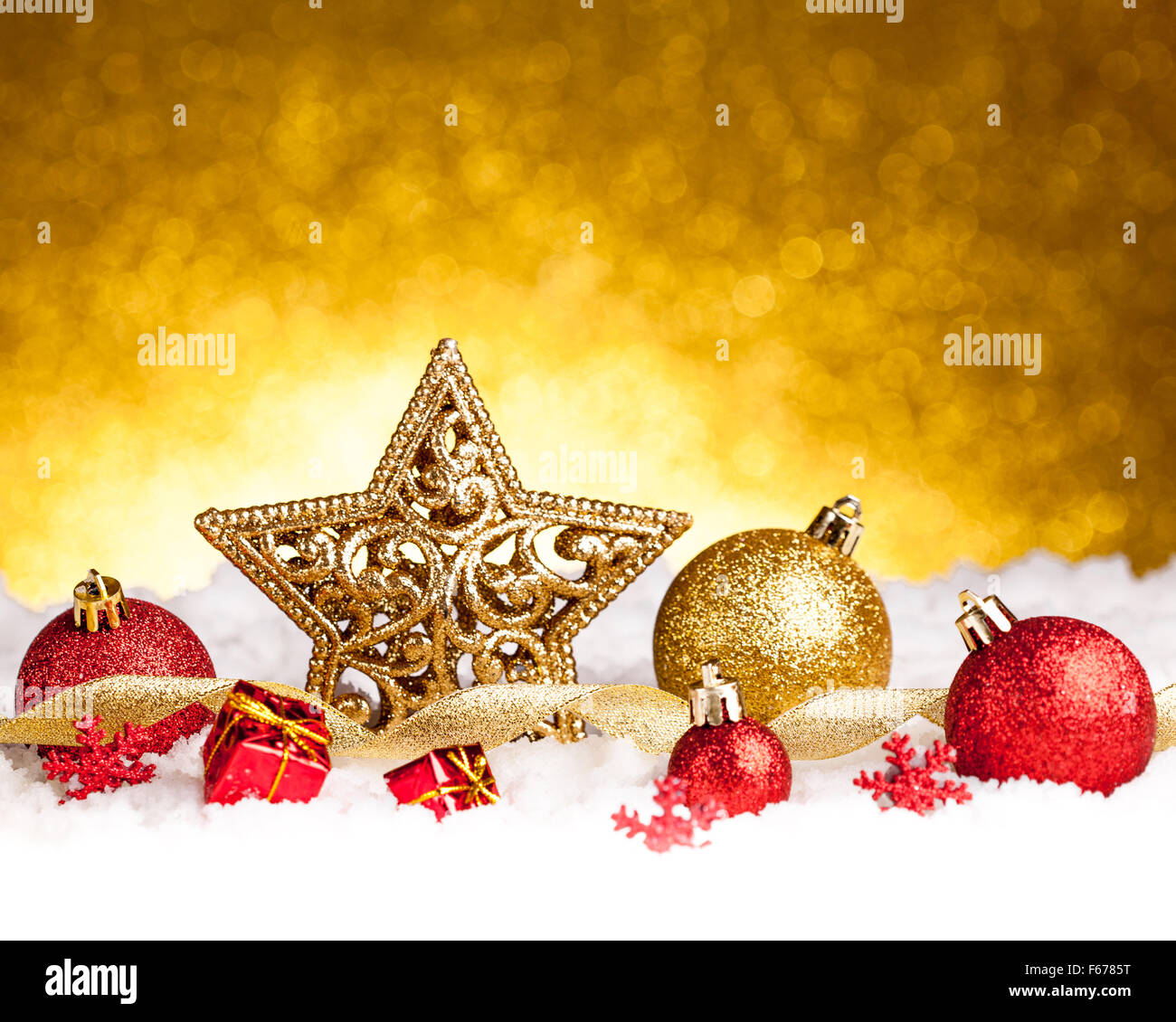 Golden christmas fir star decoration with gold and red ornaments Stock ...