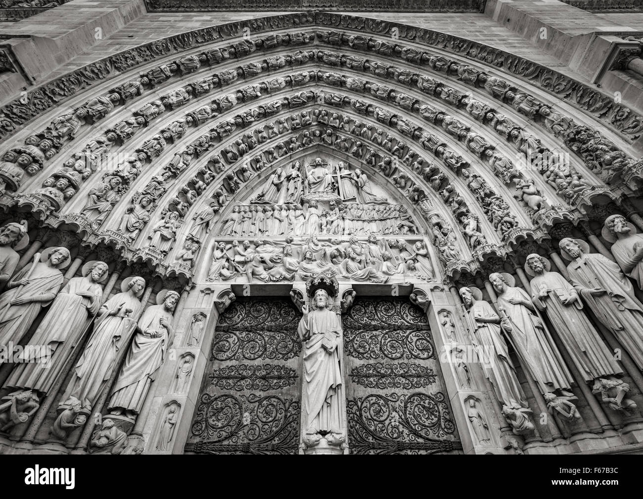 Central gothic portal of Notre Dame de Paris Cathedral featuring bas relief of the Last Judgement. Ile de la Cité, Paris, France Stock Photo