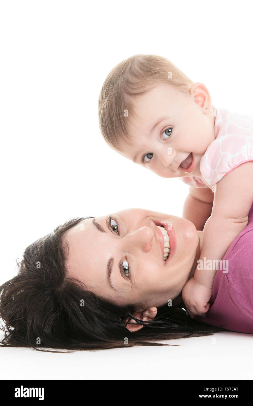 Studio Portrait Of Mother With Young Baby girl Stock Photo