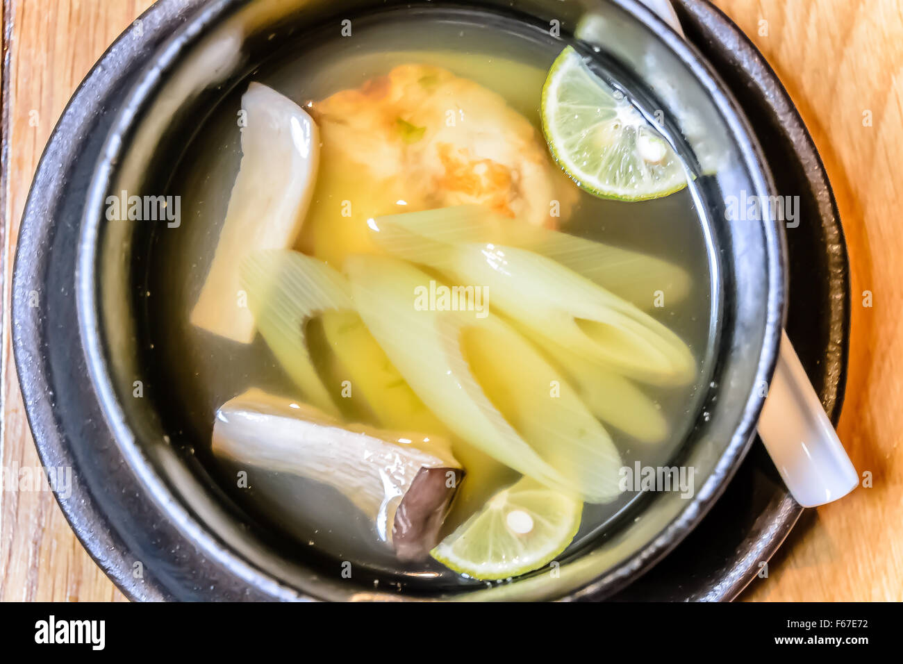 Yakifugu To Namanori Soup Shitate Grilled puffer fish and fresh seaweed soup  with grilled mushroom, leek and rice cake Stock Photo - Alamy