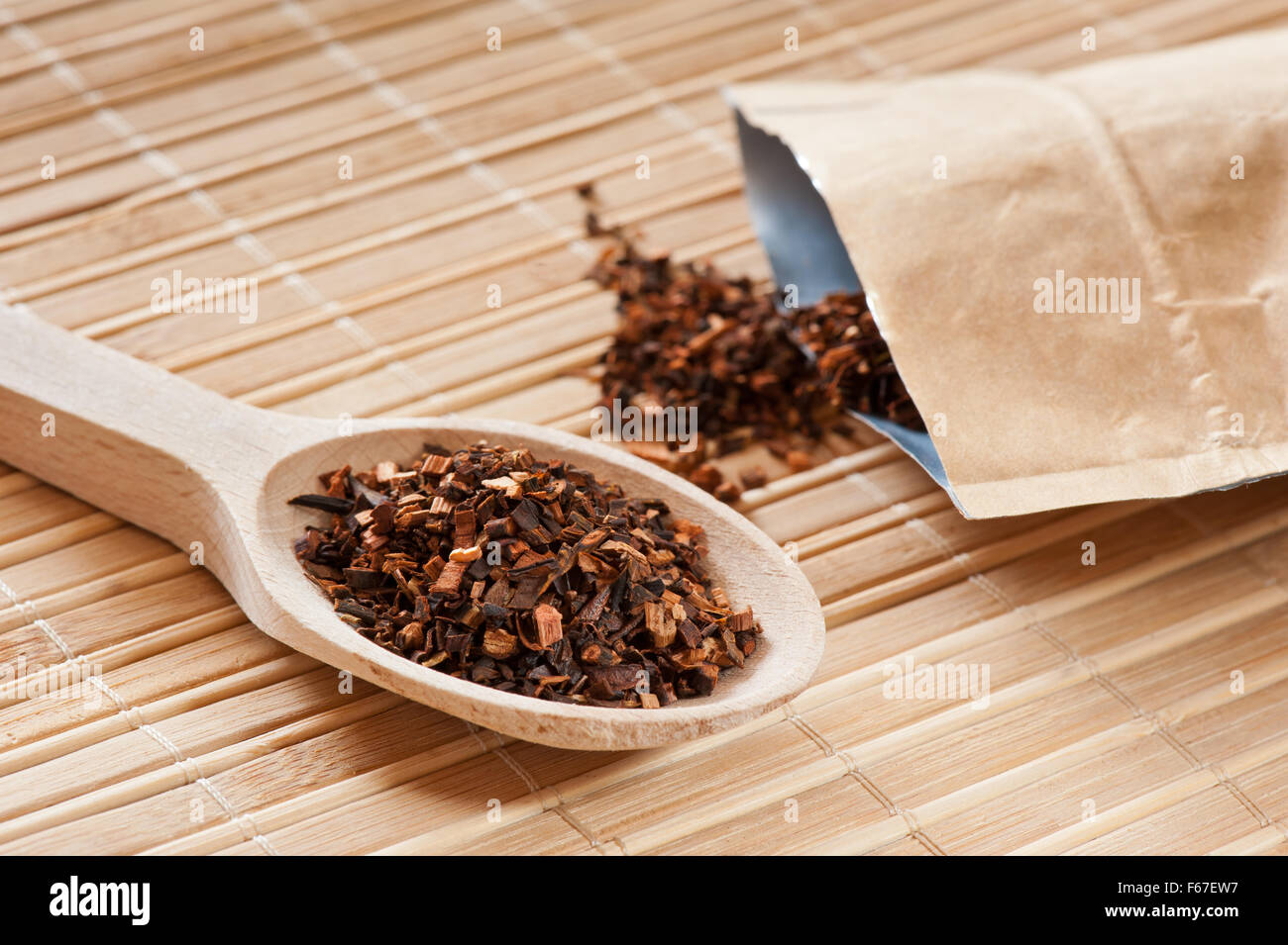Honeybush dried tea portion, Heuningbos herbal tea similar to Rooibos, made from the shoots of shrub, stems and leaves chopped Stock Photo