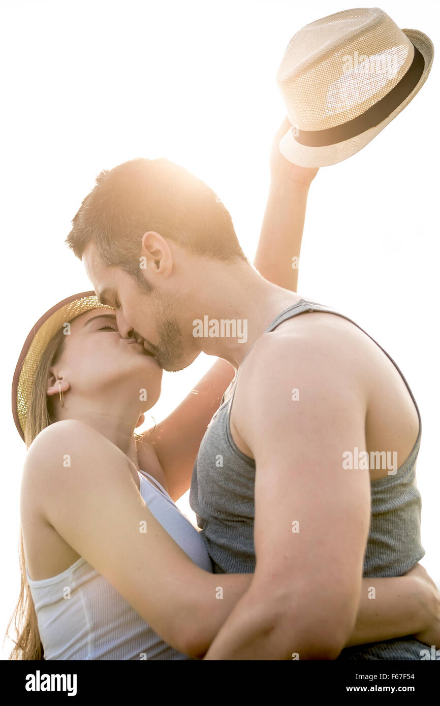 Young couple in love outdoor at the sunset Stock Photo