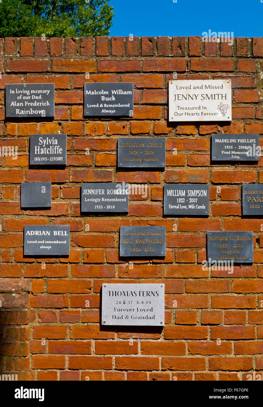 Memorial plaques on a brick wall at Rufford Abbey Ollerton in Nottinghamshire England UK in the grounds of Rufford Country Park Stock Photo