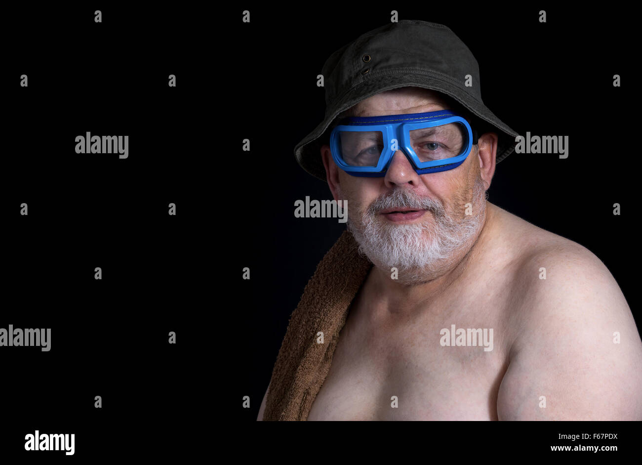 Portrait of senior man getting ready to have a bath Stock Photo