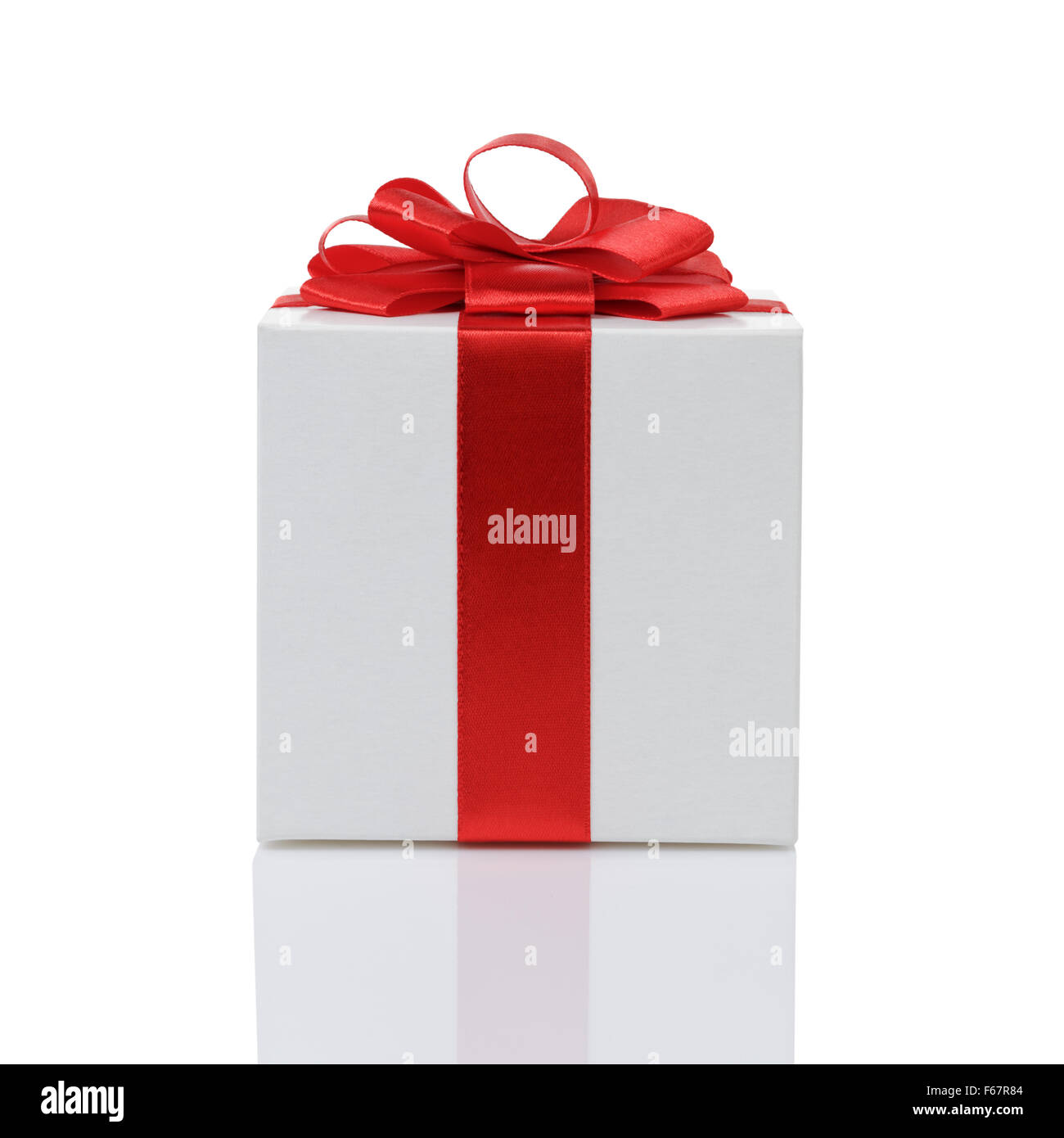 white paper gift box with red ribbon bow isolated Stock Photo