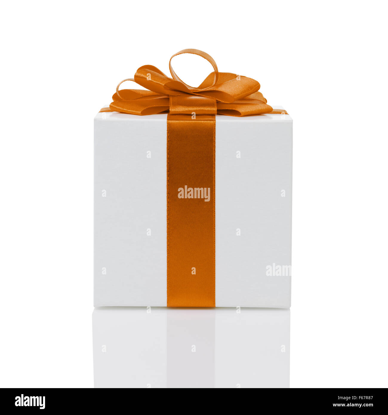 white paper gift box with orange ribbon bow isolated Stock Photo