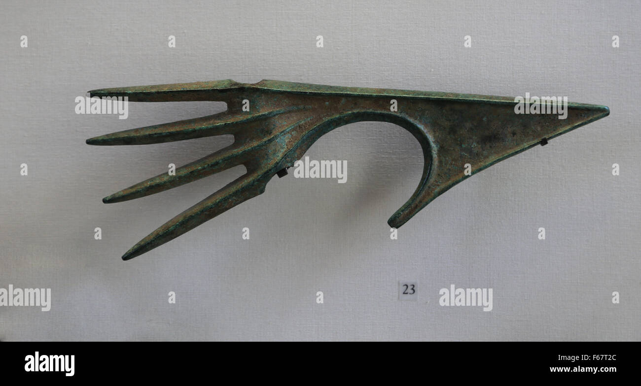 Luristan bronze ax. 1500 to C. 500 BC., Iran. Near East. Museum of Louvre. Paris. France. Stock Photo