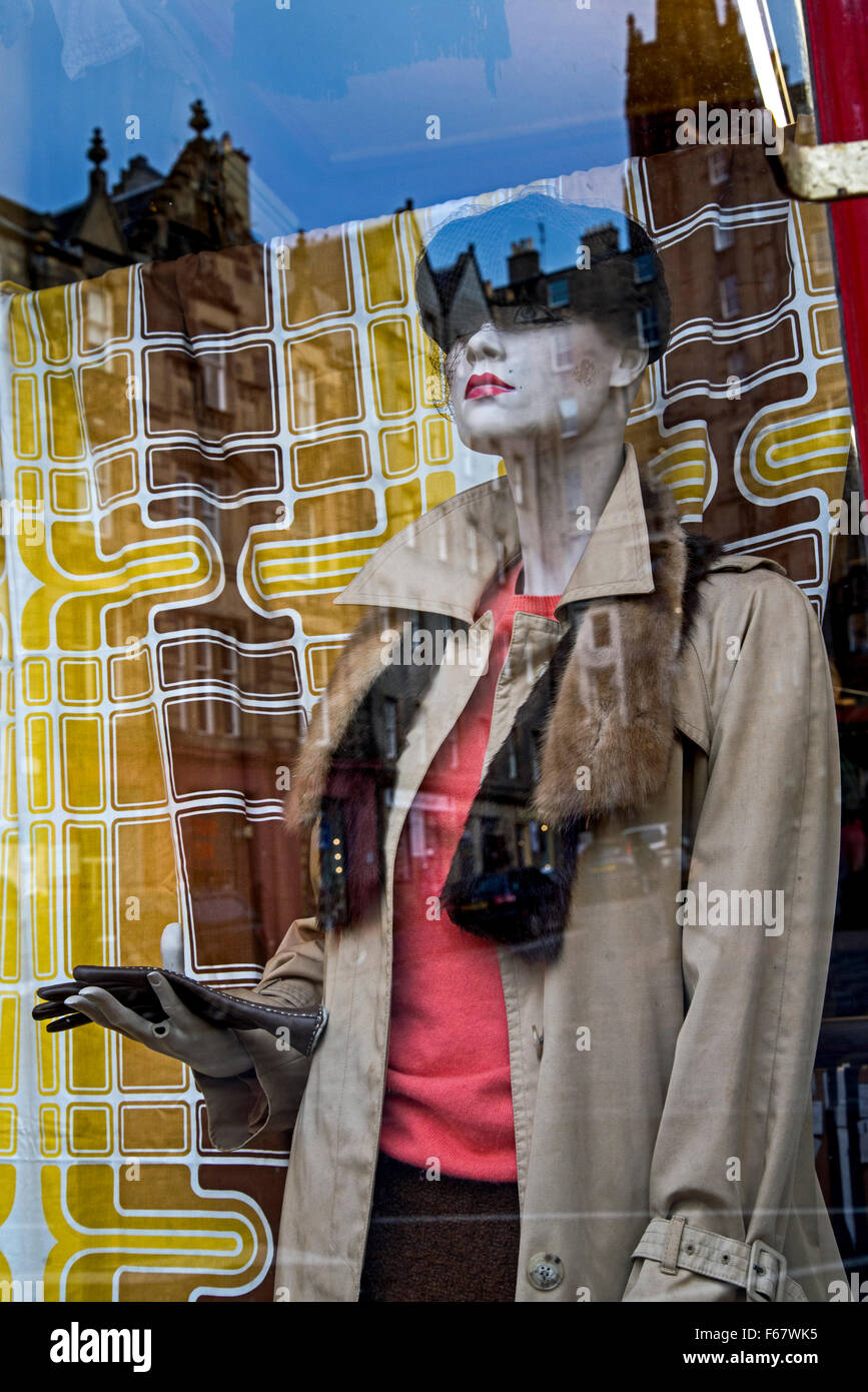 Vintage clothes in  the window of a branch of Armstrong's vintage clothing store in Edinburgh, Scotland, UK. Stock Photo