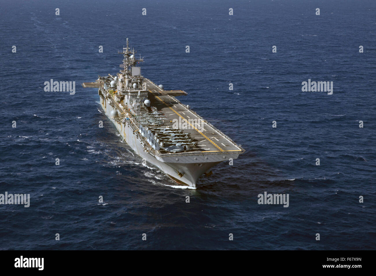 US Navy Wasp-class amphibious assault ship USS Kearsarge underway November 2, 2015 in the Red Sea. Stock Photo