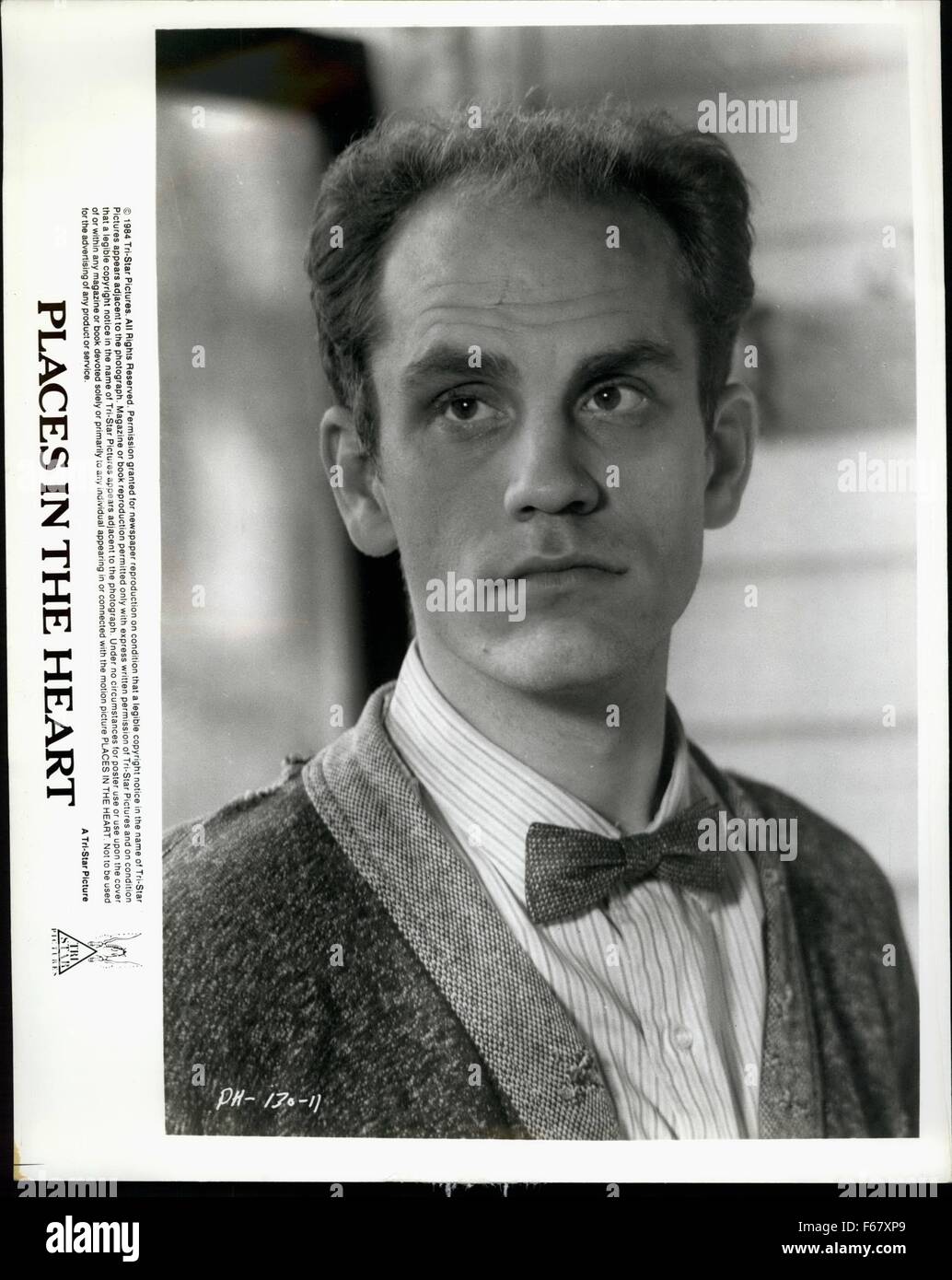 1984 - John Malkovich plays Mr. Will, a blind World War I veteran who rents a room in the home of a young widow played by sally Field in Places In The Heart. written and directed by Robert Benton and released by Tri-star, Places in the heart in the story of the young widow's struggle to keep her family together during the 1930s. © Keystone Pictures USA//Alamy Live News Stock Photo