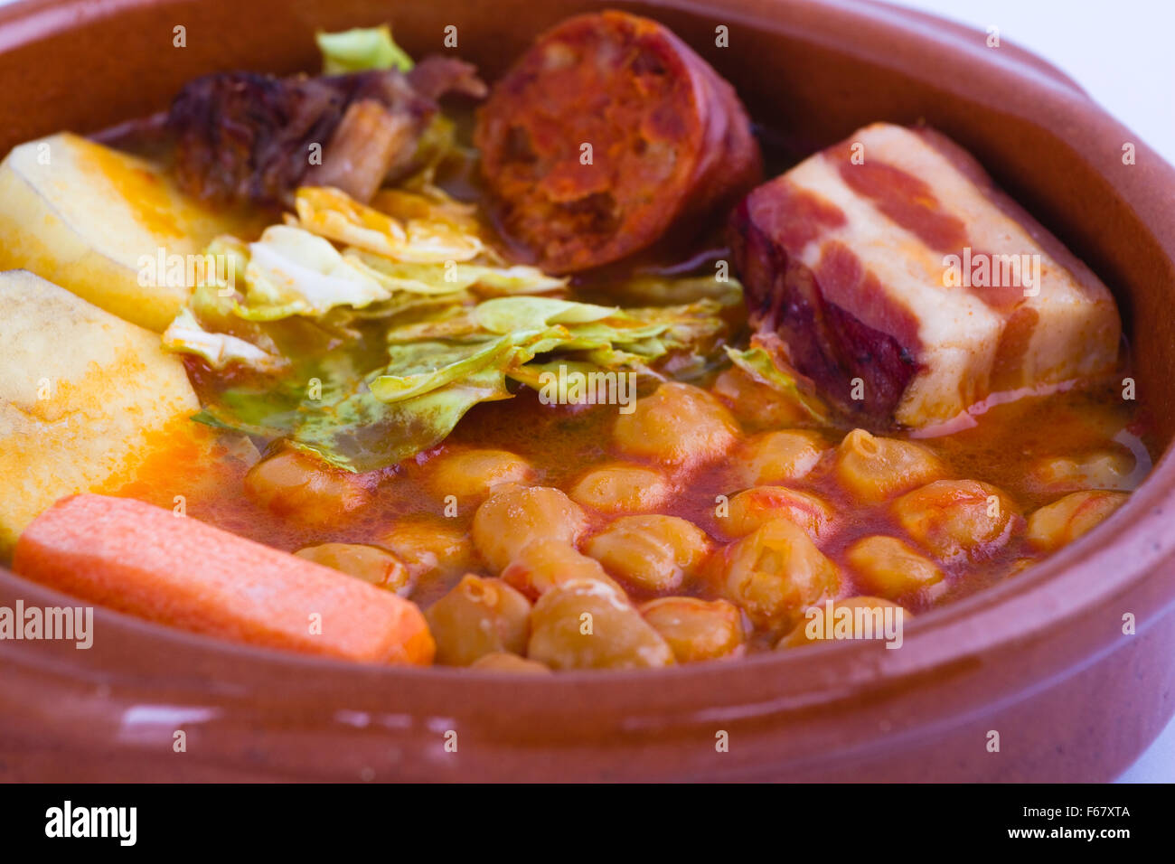 Madrid stew on earthenware pot, spanish food Stock Photo Alamy