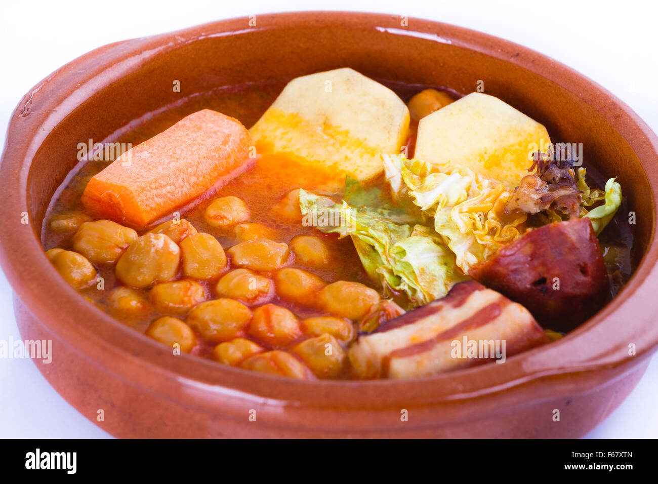 Madrid stew on earthenware pot, spanish food Stock Photo Alamy