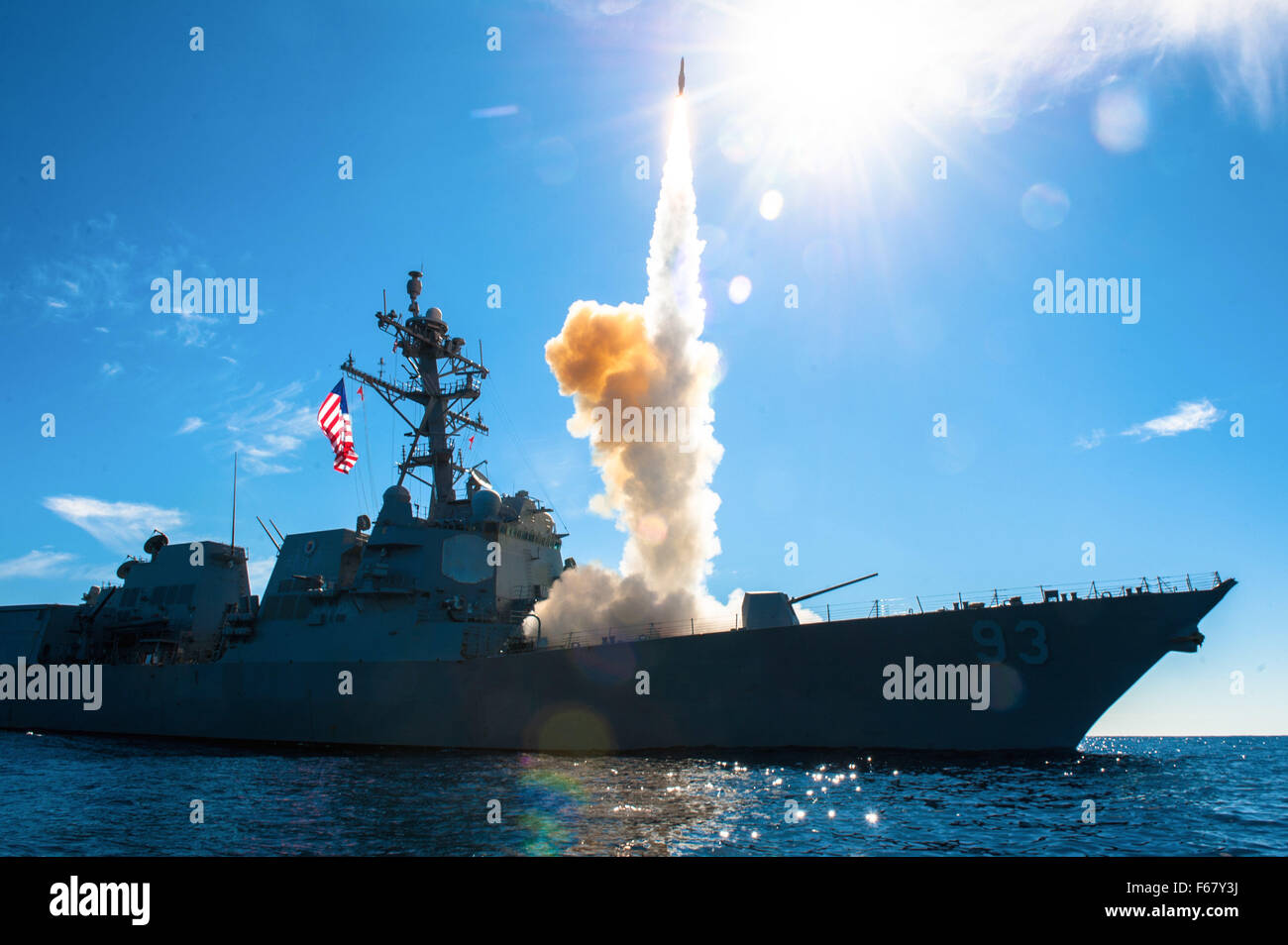 The U.S. Navy Arleigh Burke-class guided-missile destroyer USS Chung-Hoon launches a Standard Missile 2 from the forward deck during a missile exercise November 10, 2012 in the Pacific Ocean. Stock Photo