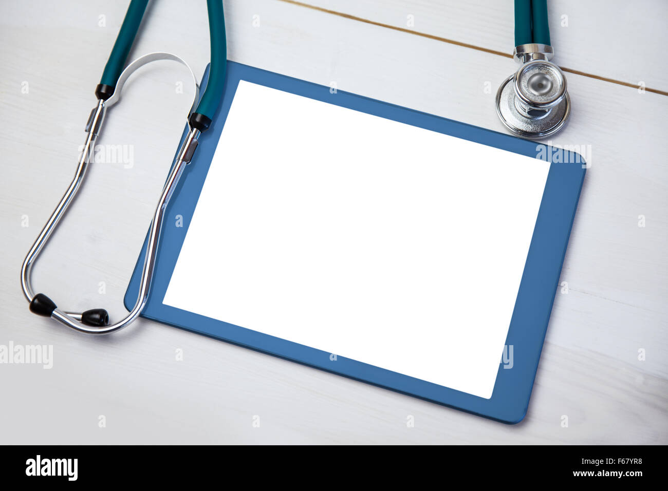 Tablet and stethoscope on desk Stock Photo - Alamy