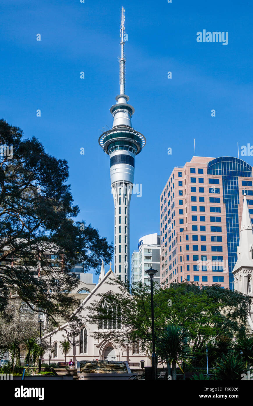 New Zealand, North Island, Auckland, St. Patricks Cathedral dwarved against the 328 metre Sky Tower Stock Photo