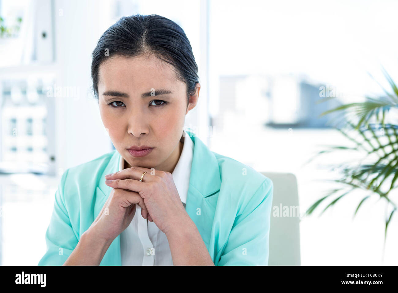 Look Over Notes Focused businesswoman looking over her notes Stock Photo - Alamy
