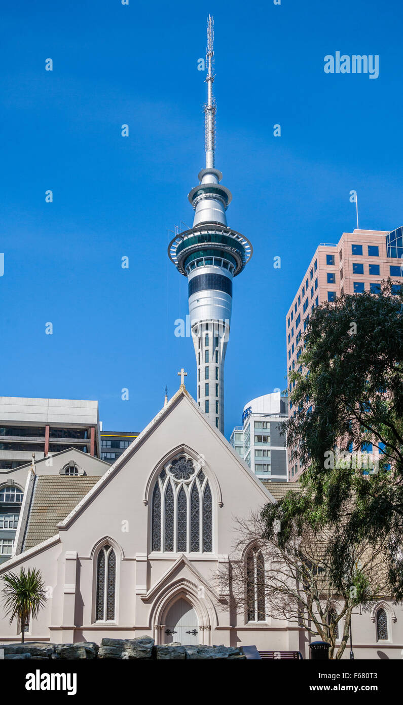 New Zealand, North Island, Auckland, St. Patricks Cathedral dwarved against the 328 metre Sky Tower Stock Photo
