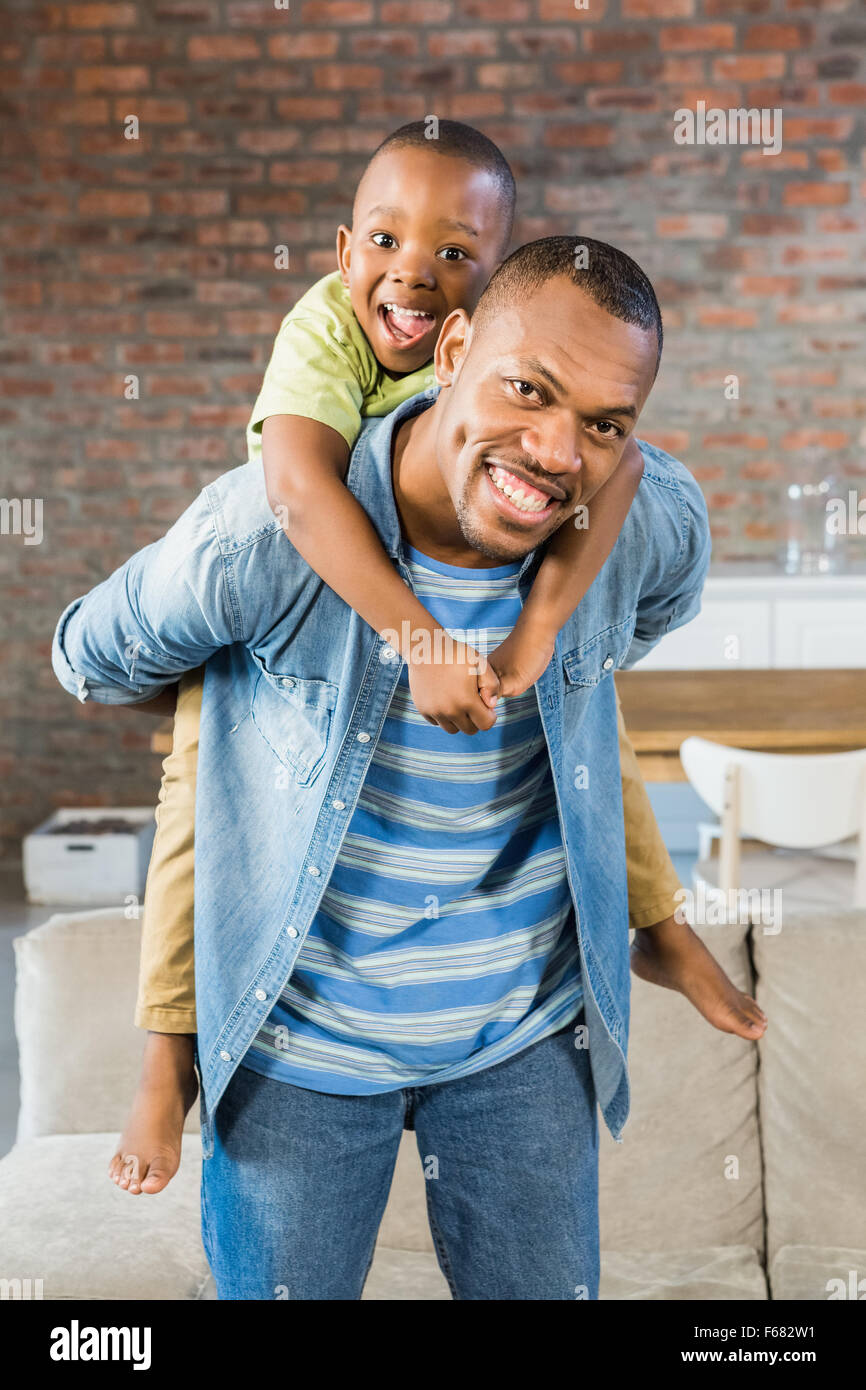 Father and son having fun at home Stock Photo