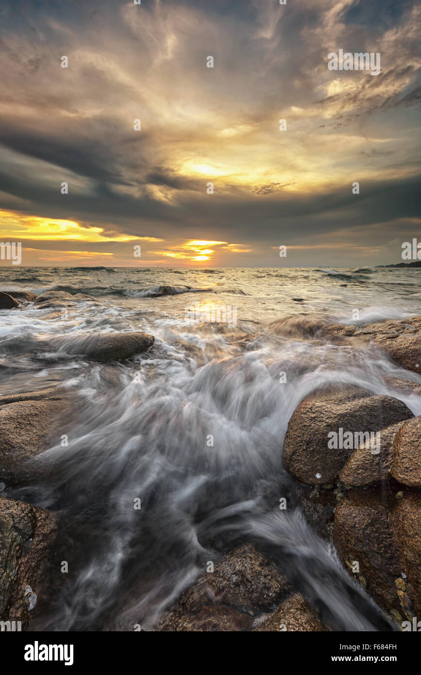 Rock Wave sunset Stock Photo - Alamy