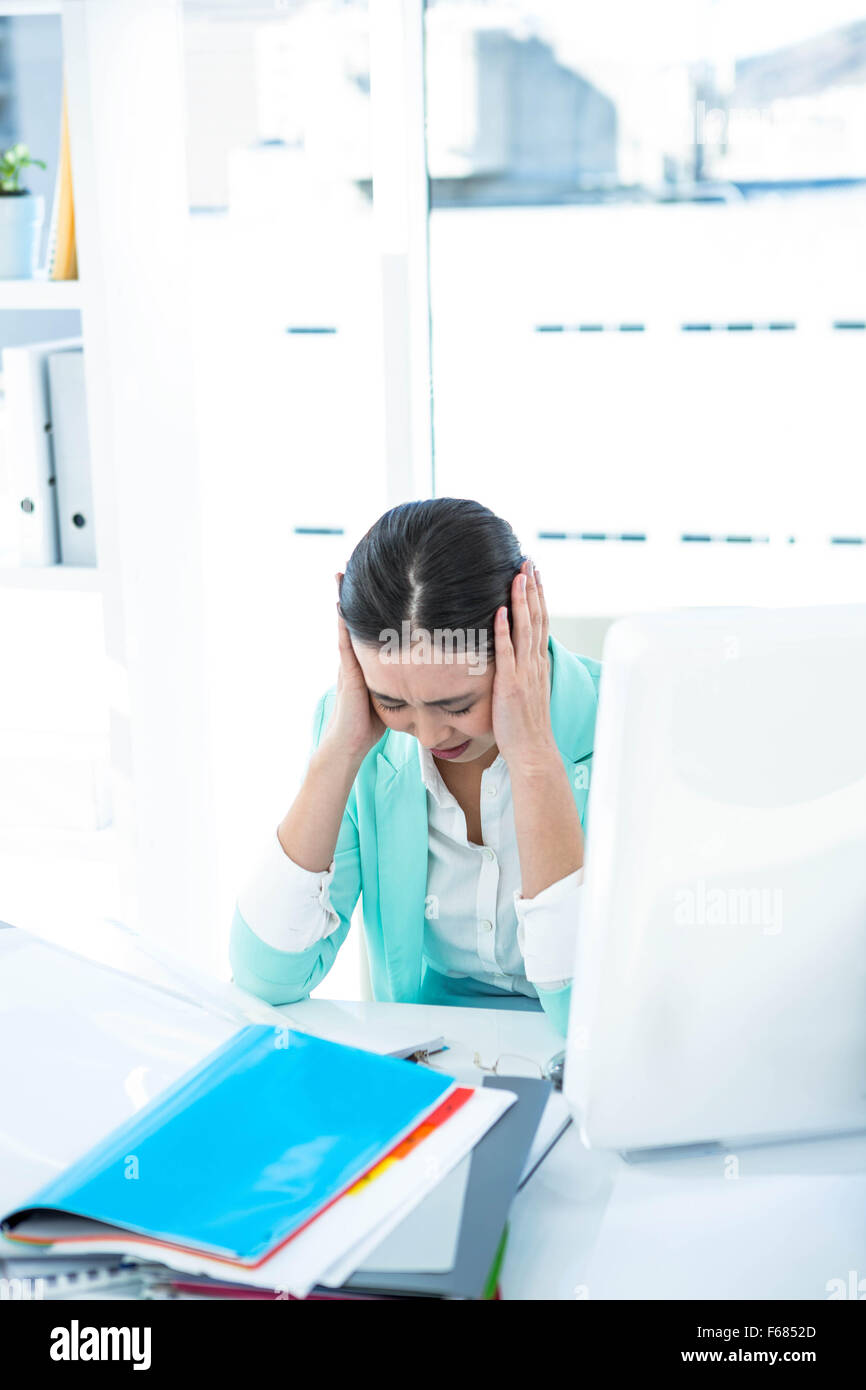 Stressed out business woman Stock Photo