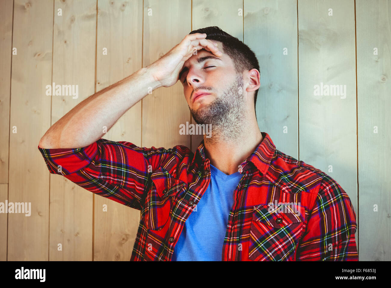 Handsome hipster feeling stressed out Stock Photo