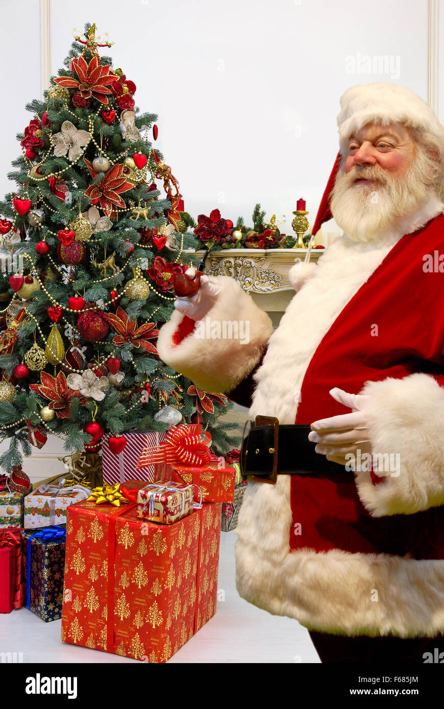 Santa Claus with a pipe Stock Photo