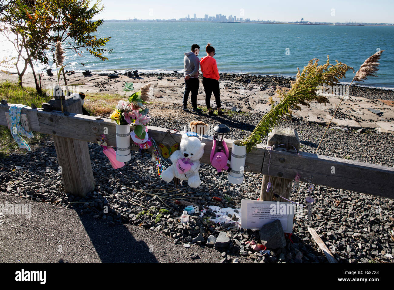 A makeshift memorial at the site where a child's body washed up on Deer Island, Winthrop
