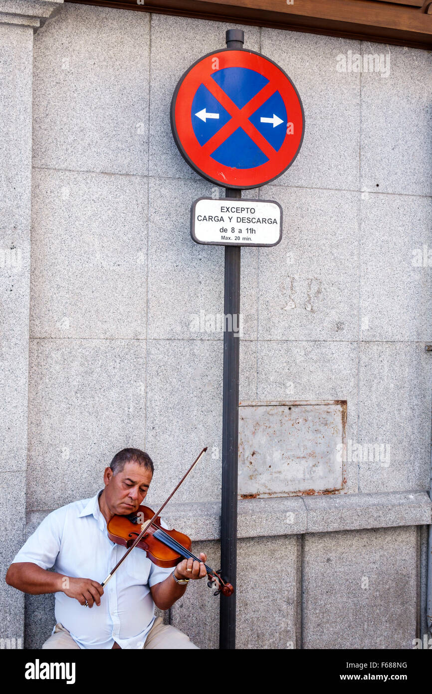 Toledo Spain,Europe,Spanish,Hispanic Plaza de Zocodover,Hispanic man men male,street musician,playing violin,Spain150703025 Stock Photo