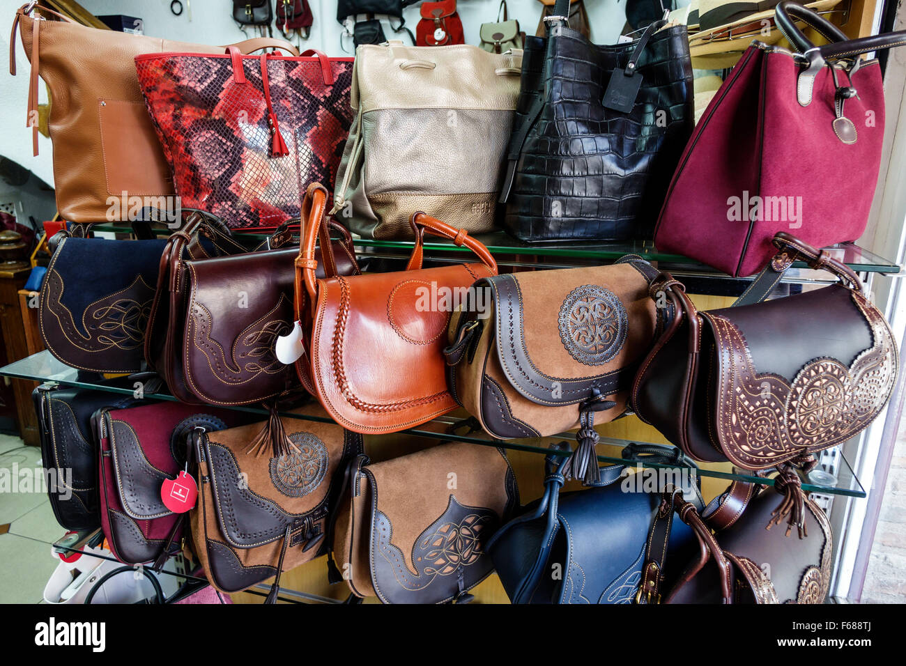 Toledo Spain,Europe,Spanish,Hispanic artisanal leather handbag purse  pocketbooks,women's,shopping shopper shoppers shop shops market markets  marketpla Stock Photo - Alamy