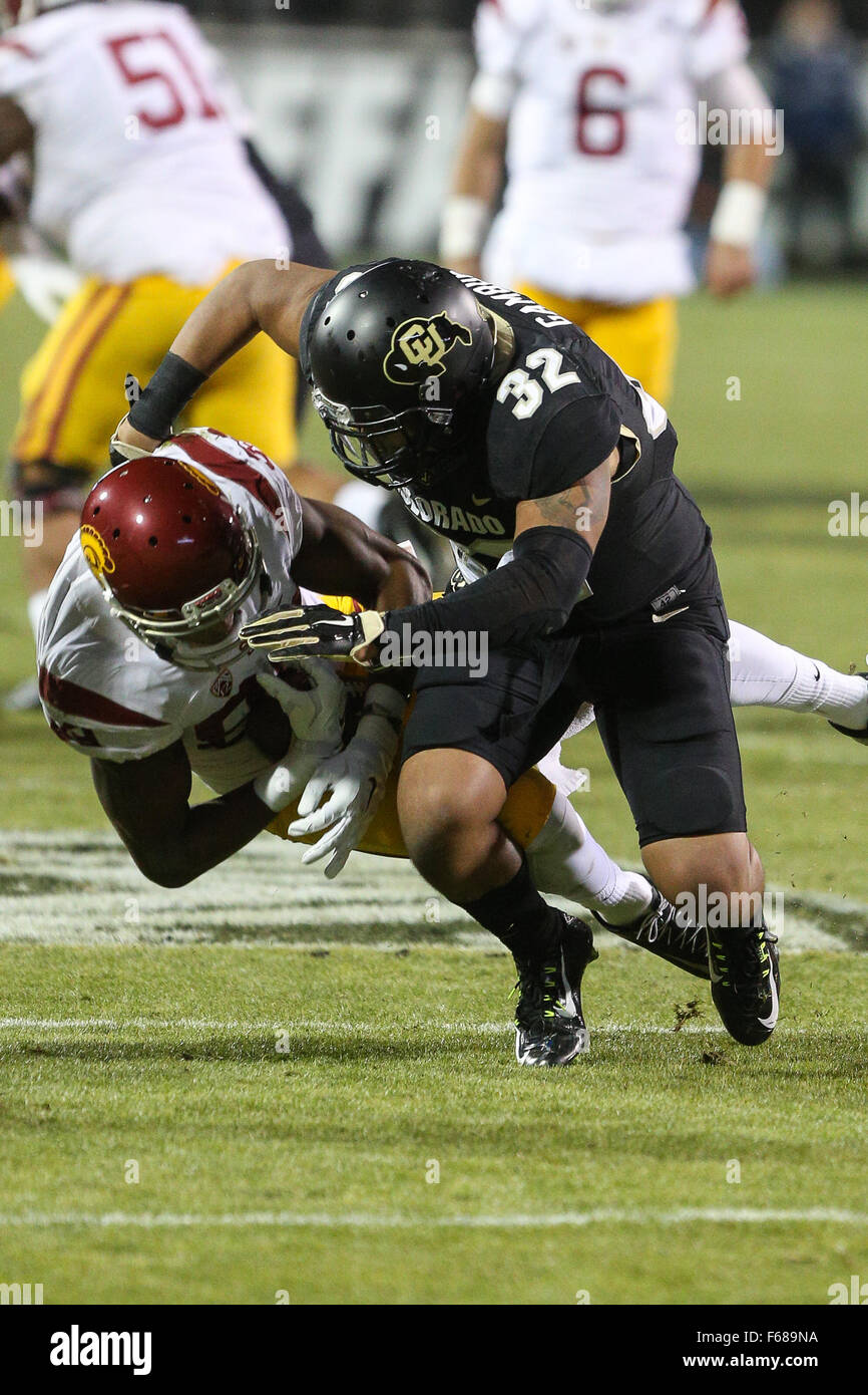 Boulder. 13th Nov, 2015. USC's Christian Rector takes a big hit from Colorado's Rick Gamboa in the first half against Colorado Friday night in Boulder. USC won, 27-24. © csm/Alamy Live News Stock Photo