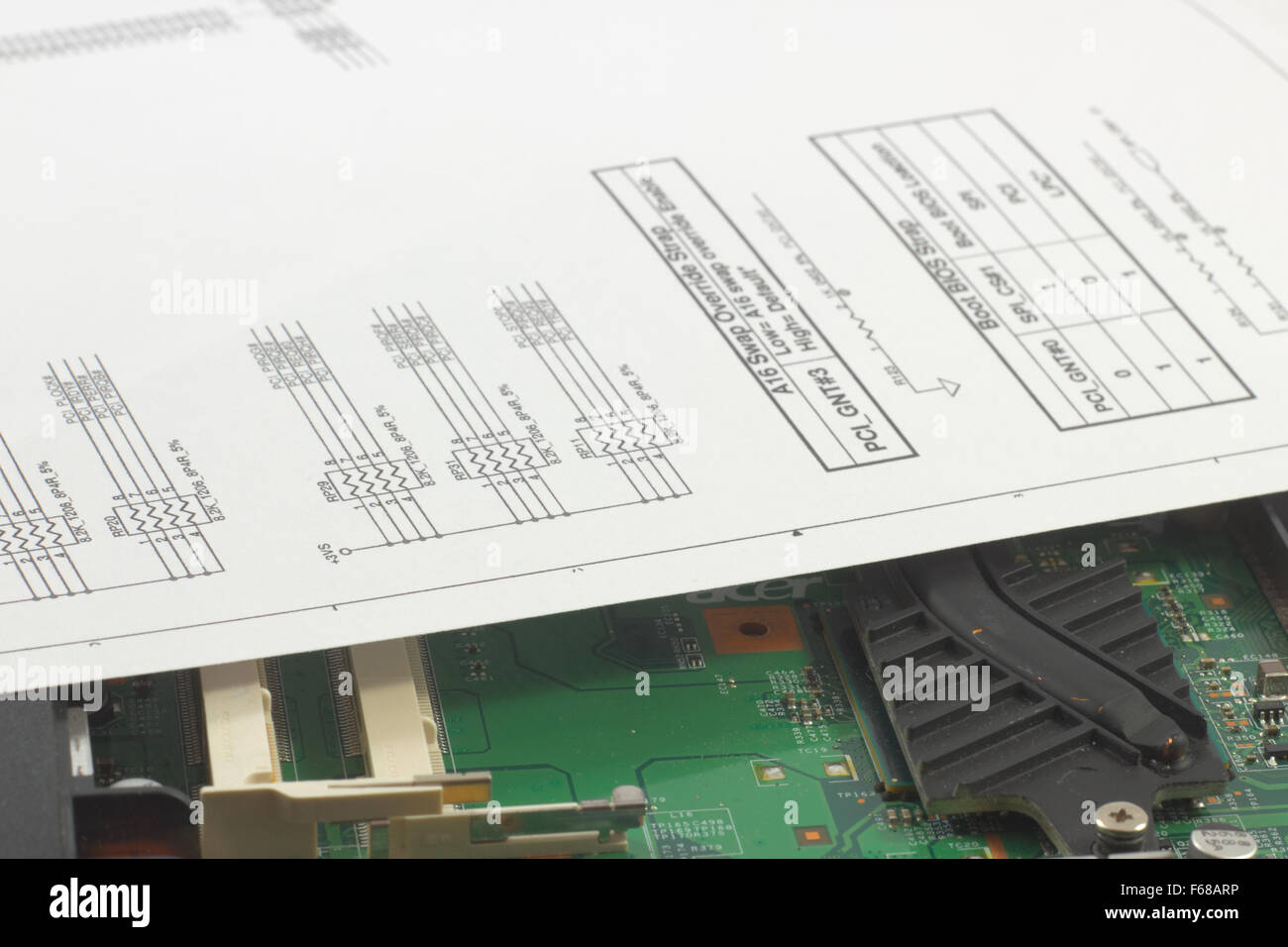 closeup of the circuits of a notebook faulty and related wiring diagrams Stock Photo