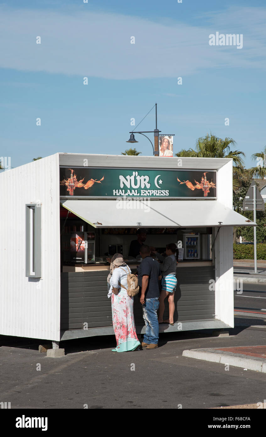 Customers at a Halal food takeaway in Cape Town South Africa Stock