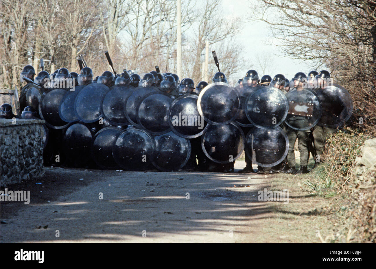 French police, Gendarmerie Mobile,  lined up against antinuclear demonstrators in Plogoff, small village in South West Brittany, France Stock Photo