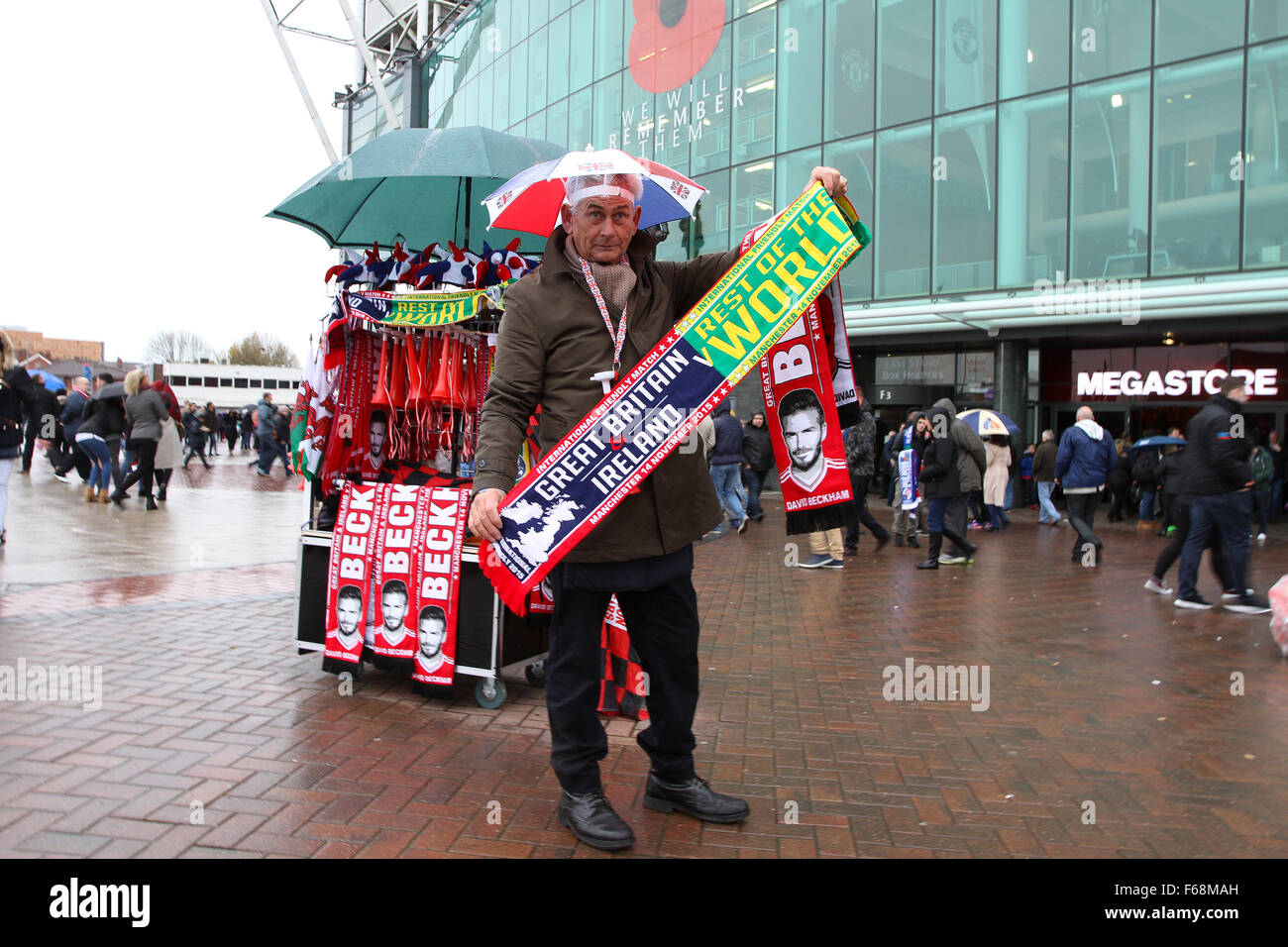 Old Trafford, Manchester, UK. 14th Nov, 2015. Unicef Match for Children. GB and NI XI versus Rest of the World XI. Souvenier seller outside the stadium ahead of kickoff Credit:  Action Plus Sports/Alamy Live News Stock Photo