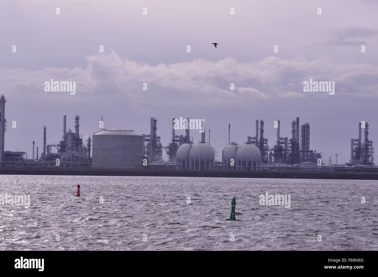 industry Teesport Tees Mouth industry fossil fuels fuel tank tanks reflection River river Cleveland UK Stock Photo