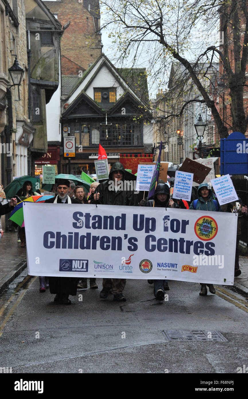 Oxford, UK. 14th November, 2015. Save Our Children's Centres protest march through Oxford to protest at the proposed closure to the counties children centres. During the week a letter from the Prime Minister, Rt Hon David Cameron, MP for Witney in West Oxfordshire, called the cuts “unwelcome and counter-productive” in leaked letter to Oxfordshire County Council chair Cllr Ian Hudspeth. Save Oxfordshire Children's Centres Campaign spokesperson Jill Huish said: ‘Cameron can't plead not guilty. Credit:  Desmond Brambley/Alamy Live News Stock Photo