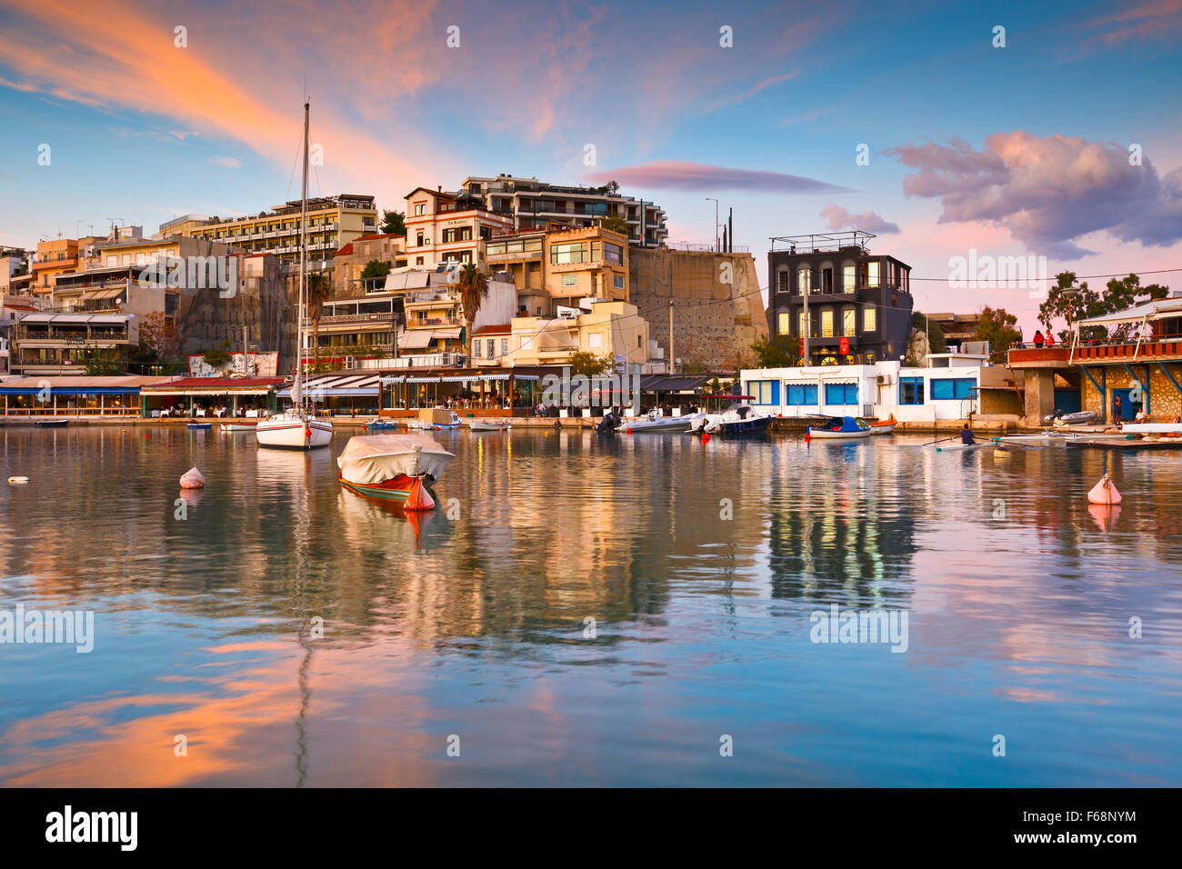 boats-and-restaurants-in-mikrolimano-marina-in-athens-greece-stock