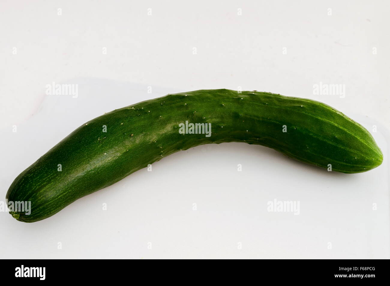 Fresh soon loose green cucumber vegetable from stem, Sofia,  Bulgaria Stock Photo