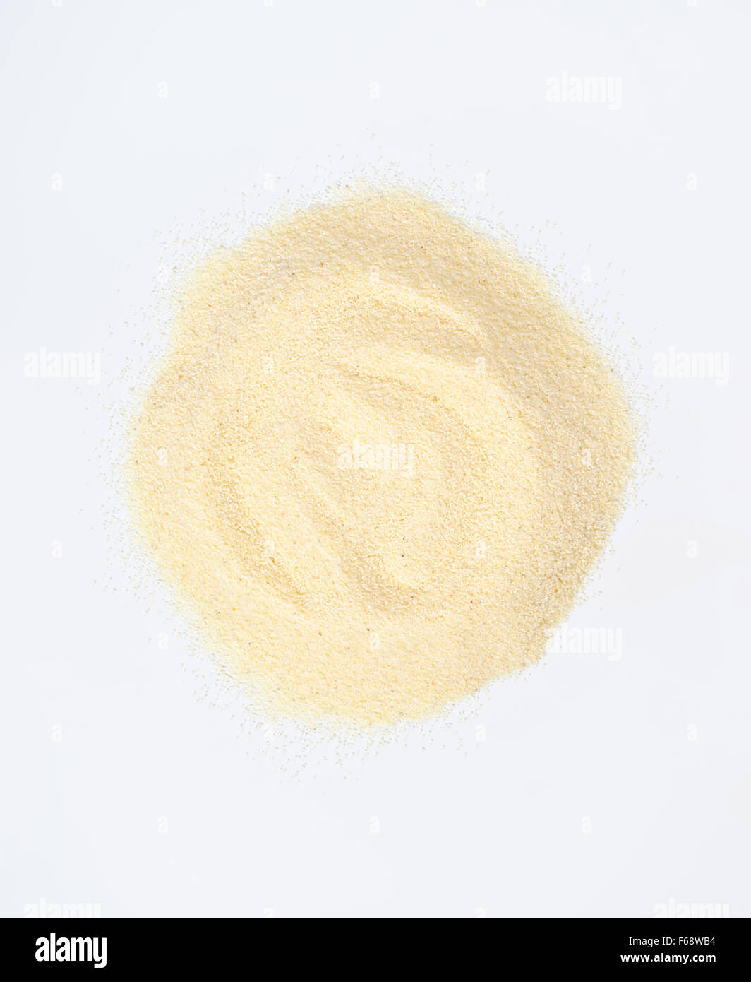 handful of grits on white background Stock Photo