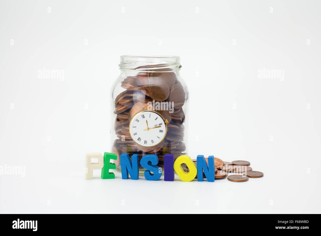 Pension coins in a glass jar with text and clock Stock Photo