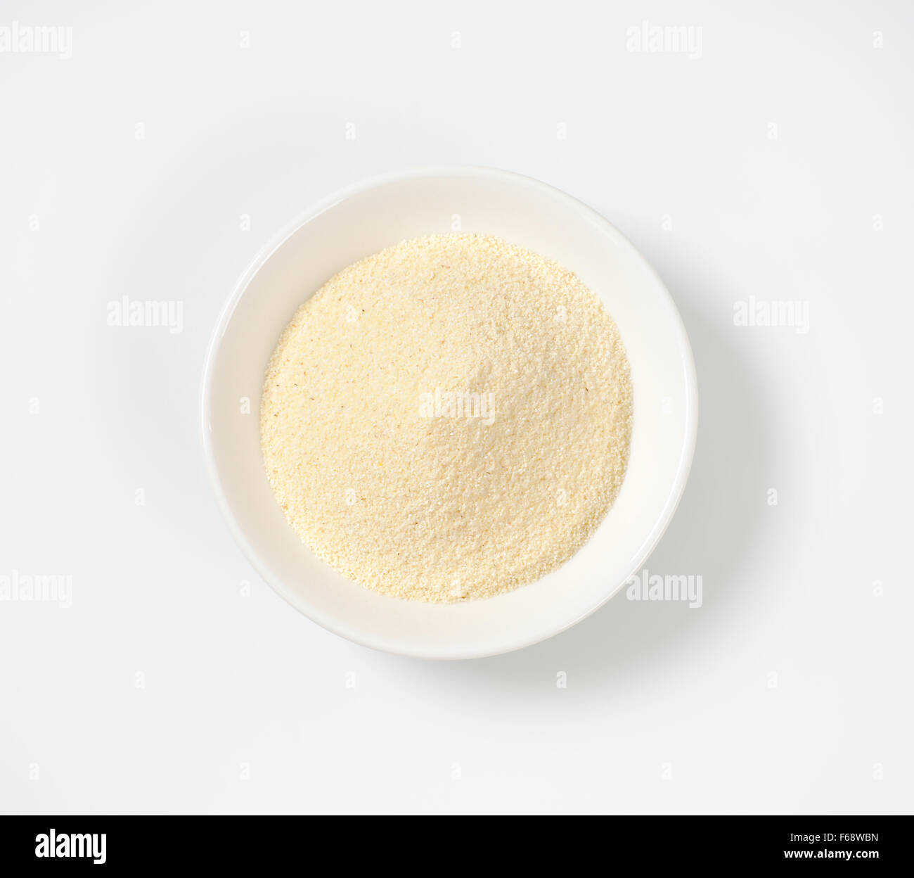 soup plate of grits on white background Stock Photo