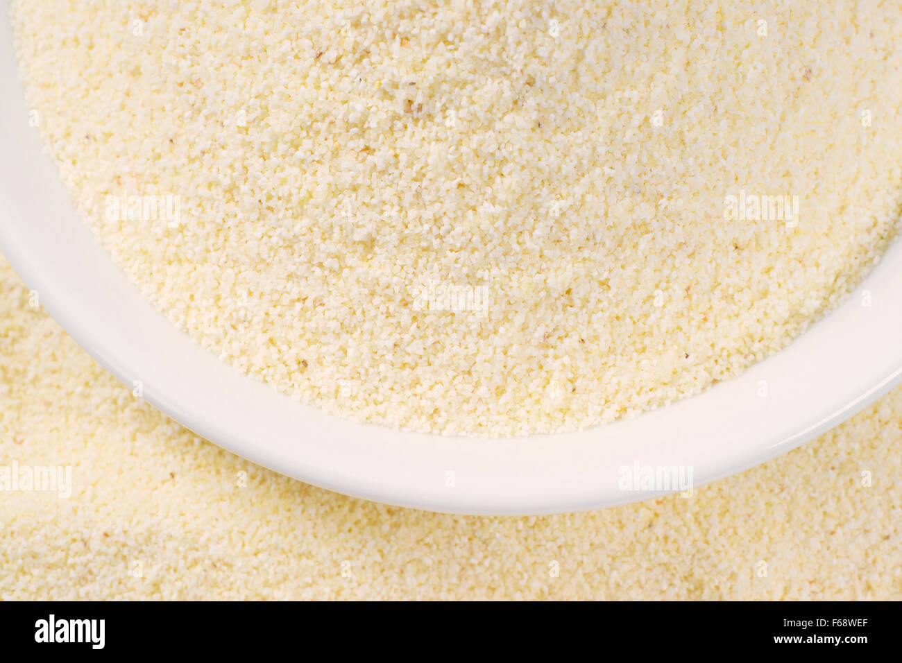 close up of grits in white soup plate Stock Photo