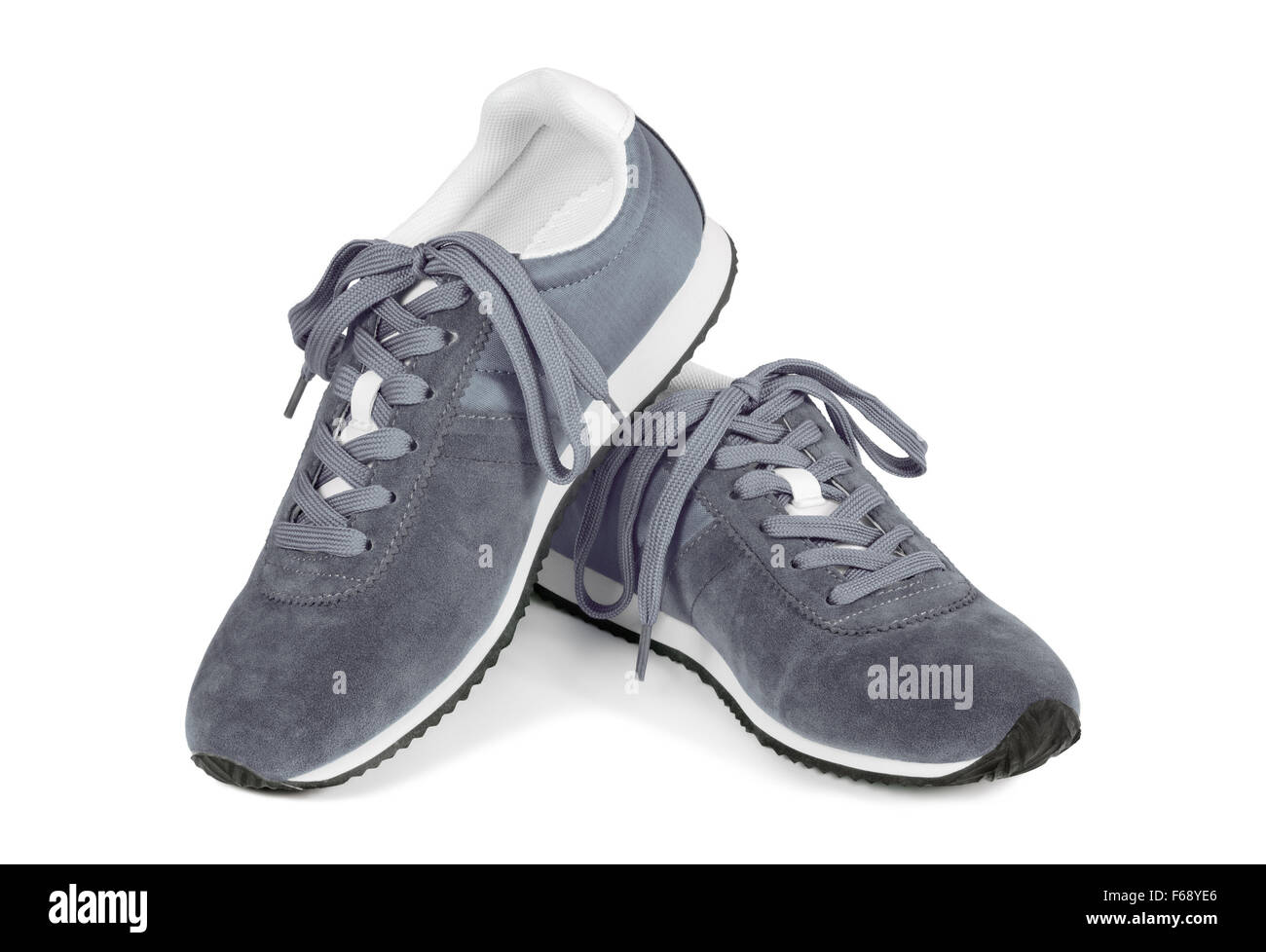 Grey running shoes isolated on white background. Casual style sneakers. Stock Photo