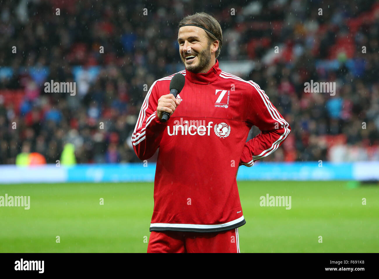 Old Trafford, Manchester, UK. 14th Nov, 2015. Unicef Match for Children. GB and NI XI versus Rest of the World XI. David Beckham addresses the fans before kickoff Credit:  Action Plus Sports/Alamy Live News Stock Photo