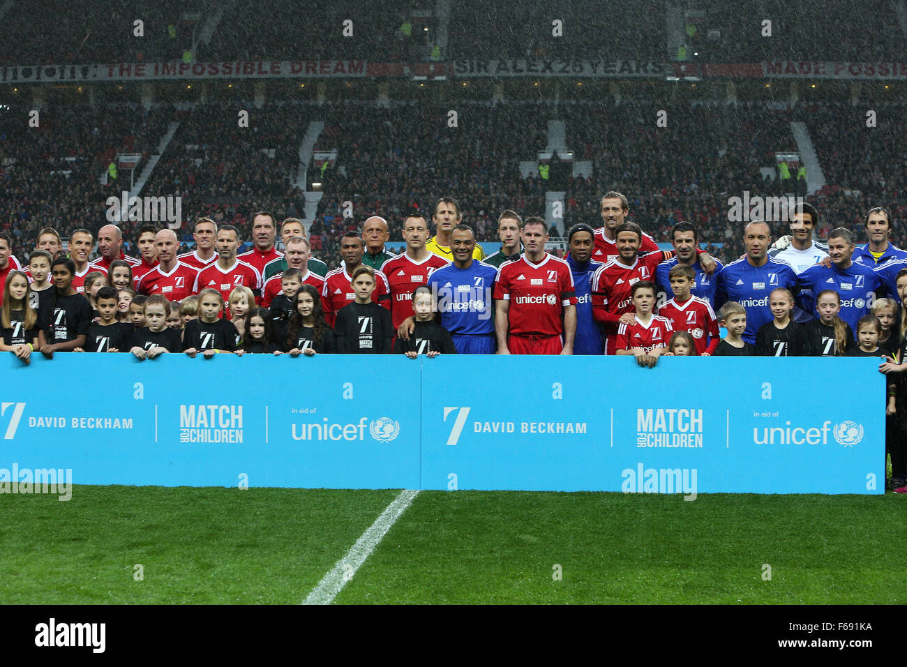 Old Trafford, Manchester, UK. 14th Nov, 2015. Unicef Match for Children. GB and NI XI versus Rest of the World XI. The teams are presented before kickoff Credit:  Action Plus Sports/Alamy Live News Stock Photo